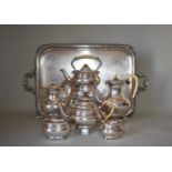 An impressive silver seven piece teaset, comprising a large twin handled tray, 76cm wide, 4600g