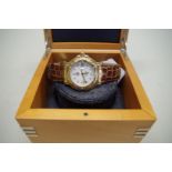 A Tag Heuer 6000 18K gold automatic wristwatch, 38mm, ref: WH514, with box.