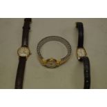 Two Omega 9ct gold ladies wristwatches; together with a gold plated example. (3)