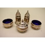 A silver five piece cruet set, by Adie Bros Ltd, Birmingham 1925, 218g weighable.