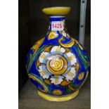 A Caltagirone tin glazed pottery vase, probably 18th/19th century, 23cm high.