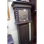 An oak longcase clock, striking on straight gongs, 185.5cm high, lacking pendulum.