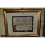 MANUSCRIPT DOCUMENT: an antique French paper document, probably 18th century, 18 x 24cm, framed