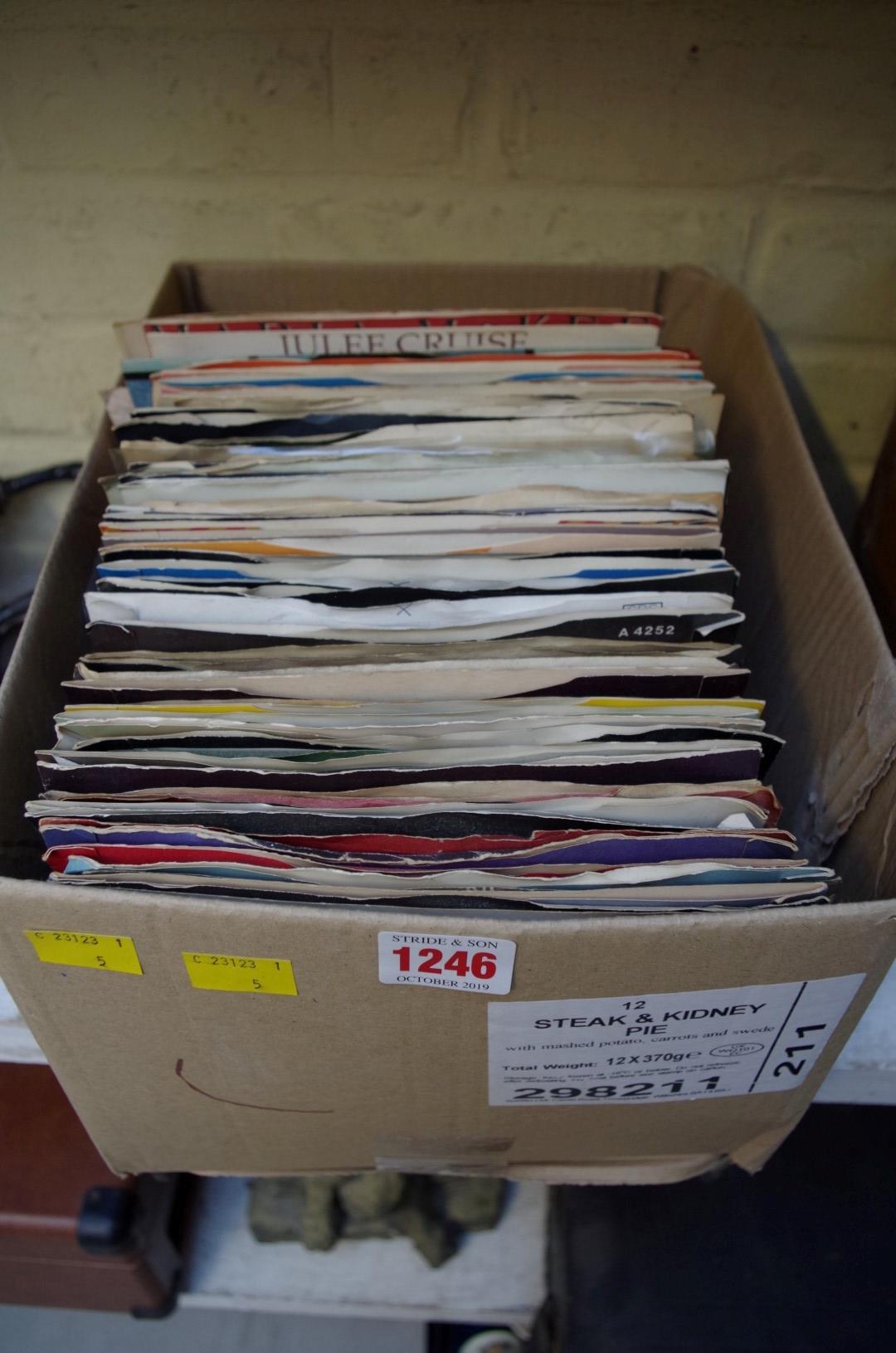 A collection of 45rpm vinyl records.