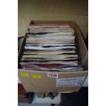 A collection of 45rpm vinyl records.