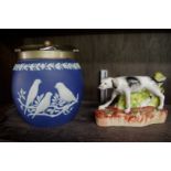 A Wedgwood Jasperware biscuit barrel; together with a Victorian Staffordshire pottery hound, 15cm