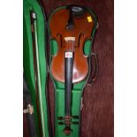 An early 20th century violin, labelled 'The Apollo, Rushworth & Dreaper, Liverpool, style 6,