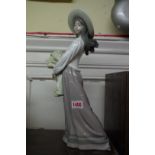 A Nao figure of a lady, 40.5cm high.