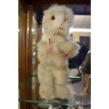 A rare Roullet & Decamps clockwork automaton white knitting rabbit, height to top of ears 37cm.