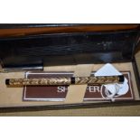 A Sheaffer Targa 676 gilt feather pattern fountain pen, in box.