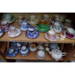 A collection of English and Continental porcelain cups and saucers; together with other pottery