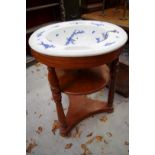 A Victorian blue and white pottery basin, probably Mintons, decorated with birds on branches, 64cm