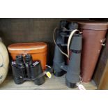 Two cased pairs of binoculars, to include a pair of Telstar 45x70 examples.