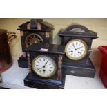 Three Victorian slate and marble clocks, largest 32cm high.