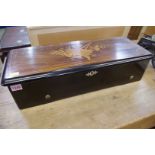 A late 19th /early 20th century rosewood, ebonized and inlaid cylinder music box, with 13 1/8in