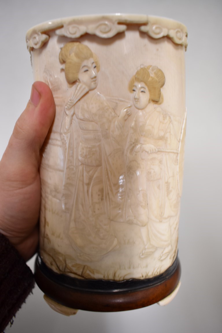 A Japanese ivory tusk vase and cover, Meiji, carved in relief with a figure and geishas in a garden, - Image 7 of 7