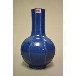 An unusual Chinese blue monochrome octagonal baluster vase, 18th century, with ribbed decoration,