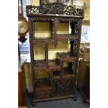 A good Chinese carved and pierced hardwood display cabinet, late 19th century, 183.5cm high x 89.5cm