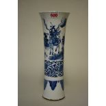 A Chinese blue and white gu vase, painted with a continuous scene of figures in a landscape above