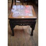 A Chinese carved hardwood and marble top jardinière stand, 45cm high x 38cm wide.