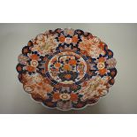 A large Japanese Imari charger, Meiji, of shaped outline, 46cm diameter.