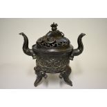 A large Chinese bronze twin handled 'five elephant' tripod censer and cover, Ming, archaistic mark