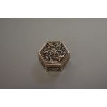 A small Chinese silver hexagonal casket, 3.7cm wide.