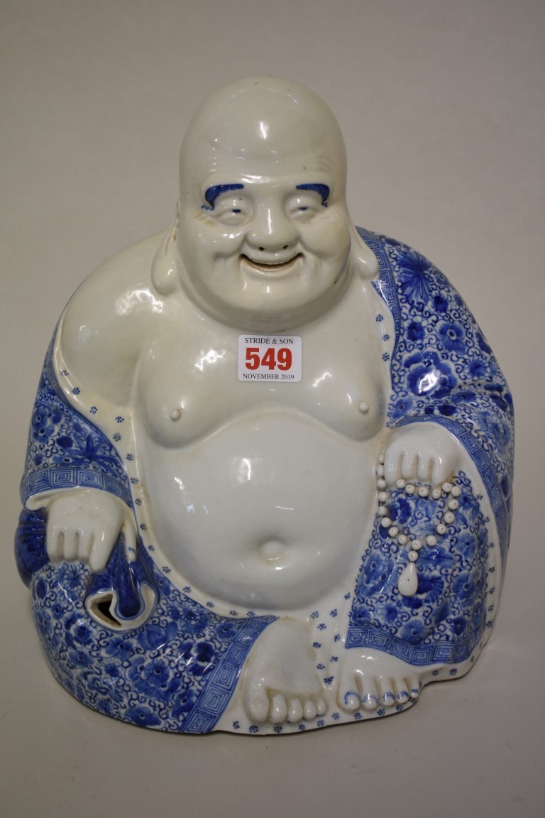 A large Chinese blue and white Buddha, seal mark of Ye Lian Deng Zao, 27cm high.