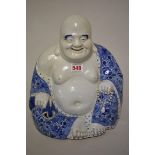 A large Chinese blue and white Buddha, seal mark of Ye Lian Deng Zao, 27cm high.