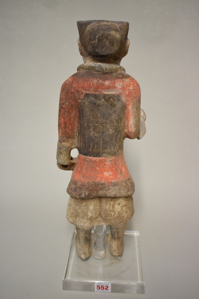 A Chinese terracotta figure of a soldier, Han dynasty, with remains of painted decoration, 46.5cm - Image 5 of 7