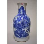 A Chinese blue and white vase, late 19th century, painted with figures in an extensive landscape,