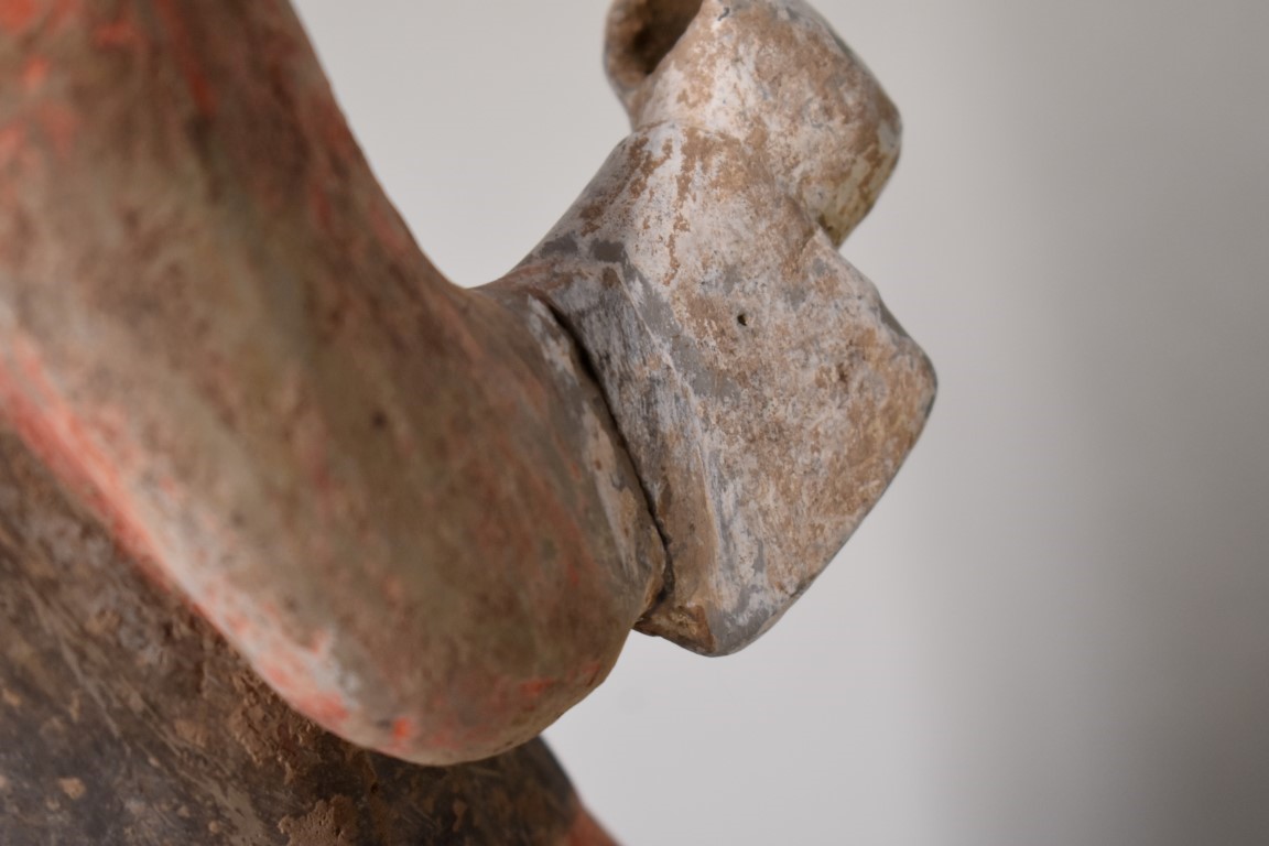 A Chinese terracotta figure of a soldier, Han dynasty, with remains of painted decoration, 46.5cm - Image 6 of 7