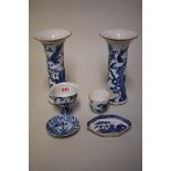 A small collection of Chinese blue and white porcelain, 18th century, comprising: a pair of gu