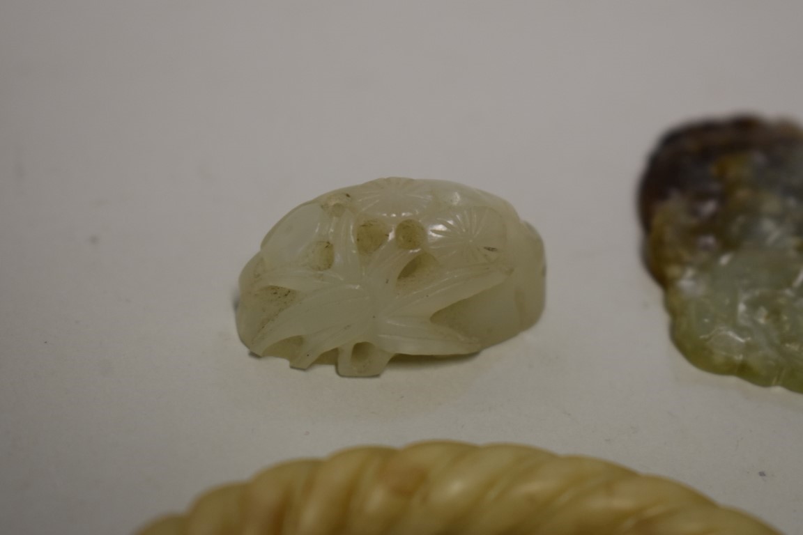 A small group of Chinese jade, comprising: three bangles, on with wrythen decoration, a carved - Image 3 of 6