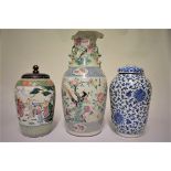 Three Chinese porcelain vases, 19th century, comprising a large famille rose twin handled vase ,