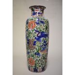 A Chinese wucai Rouleau vase, Qing, painted with phoenix, 44cm high, (drilled through base, rim