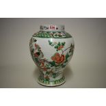 A Chinese famille verte inverted baluster jar, 18th/19th century, painted with phoenix and flowering