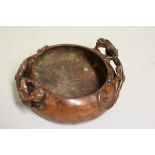 A Chinese bronze twin handled censer, four character seal mark to base, with chilong handles, 12cm