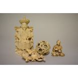 A small group of Chinese and Japanese carved ivory, comprising: a seated figure, seal mark to