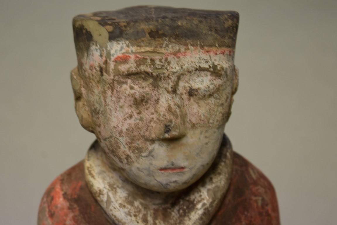 A Chinese terracotta figure of a soldier, Han dynasty, with remains of painted decoration, 46.5cm - Image 2 of 7