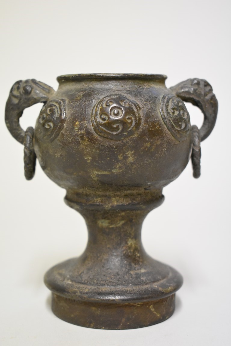 An interesting and unusual Chinese Archaic twin handled dou or stem cup, relief decorated with - Image 2 of 5