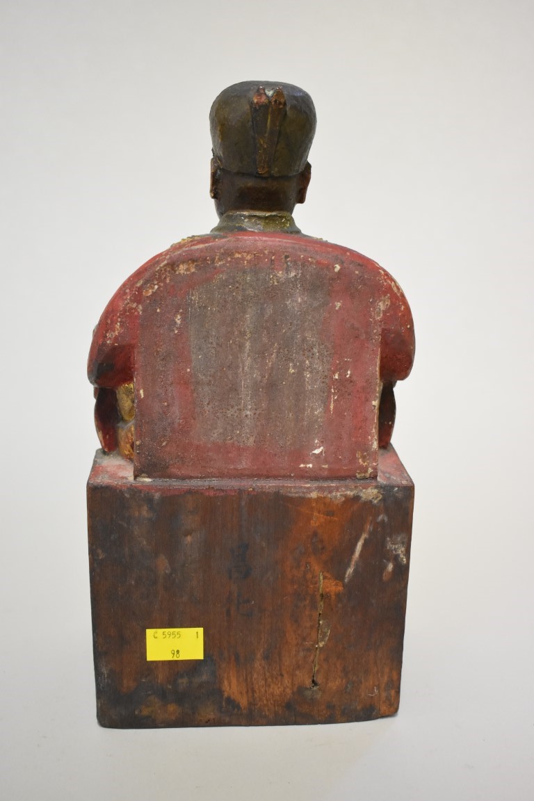 A Sino-Tibetan carved and painted wood seated figure, 30cm high. - Image 5 of 7