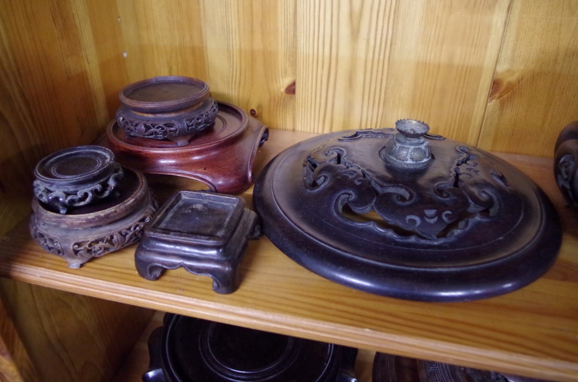 A collection of eighteen Chinese hardwood stands; together with a part stand; three covers; and - Image 4 of 5