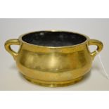 A Chinese bronze twin handled censer, Xuande six character mark, 19cm wide, 1101g.