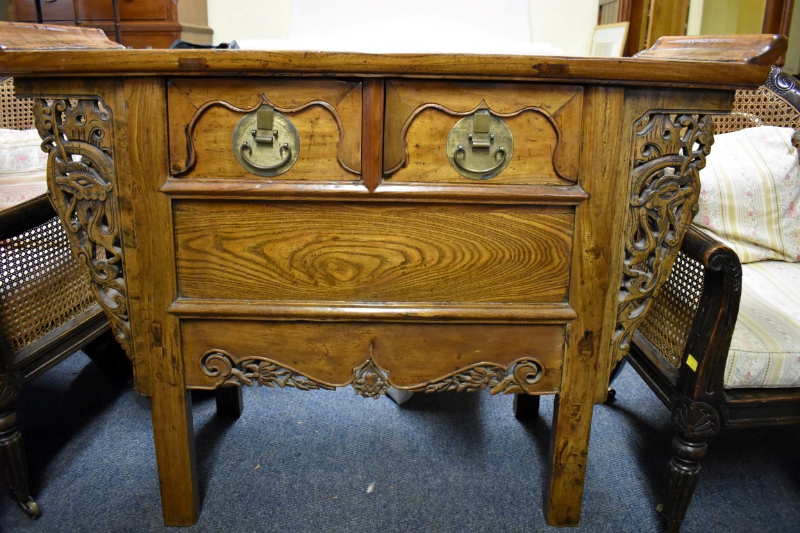 A Chinese elm alter style side table, with a pair of frieze drawers, 111cm wide.