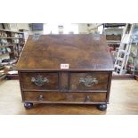 An 18th century style walnut table top bureau, 40cm wide.