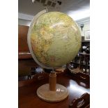 A vintage terrestrial globe, total height 54cm.