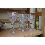 A set of six wine glasses, (variations in height).