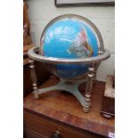 A pietra dura terrestrial globe, on plated stand, 47cm high.