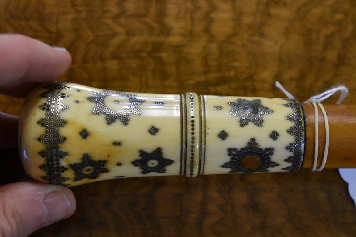 A Queen Anne ivory and pique handled malacca cane, decorated with stylized flower heads. - Image 3 of 5